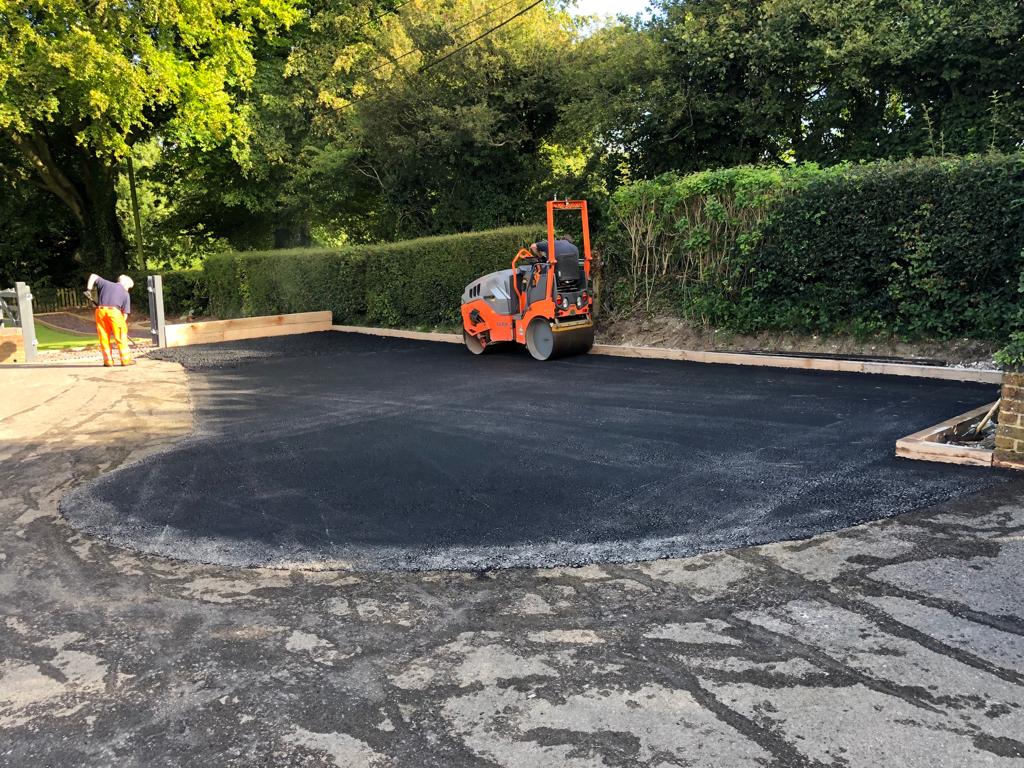 This is a photo of a bitumen driveway which is in the process of being installed by Buderim Surfacing Solutions